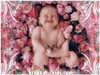 Geboortekaarten, een baby in een bed van rozen, babykaarten