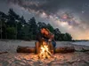 Romantisch kampvuur op het strand onder de sterren