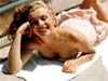 Pin-Up kaarten Marilyn Monroe lachend in bed